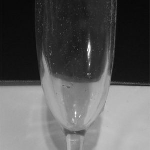 Breakaway Champagne glass. Tint: Clear - some micro bubbles with slight chip on rim Breakaway Champagne glass suitable for feature film live action, theatre or events.
